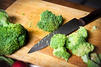 Closeup of cut fresh broccoli on cutboard
