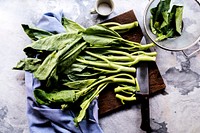 Fresh green chinese kale on a cutting board