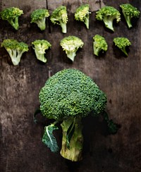 Aerial view of fresh broccoli on wooden background