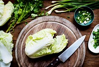 Aerial view of knife with fresh organic chinese cabbage