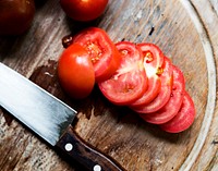 Slice of tomatoes on a cutting board