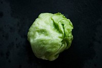 Organic cabbage fresh on black background