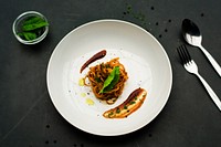 Food styling steak on white plate