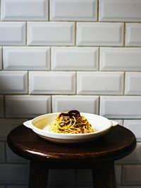 Food styling spaghetti plate on the chair