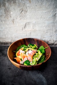 Avocado salmon salad healthy food in rustic style