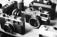 Group of vintage film cameras grayscale