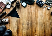 Aerial view of camping stuff on wooden background