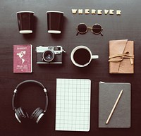 Flat lay of gadgets on black background