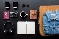 Flatlay of gadgets on black background