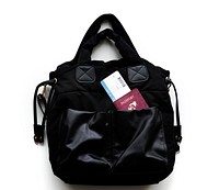 Passport and boarding pass in a handbag