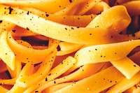 Closeup of cooked pasta textured background