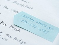 Closeup of reminder paper note