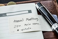 Close up of a note about annual meeting