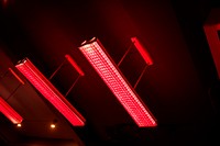 Red fluorescent lamp hanging from the ceiling