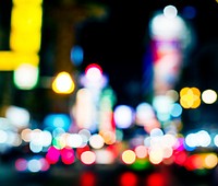 Blurred street bokeh lights at night time