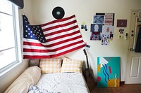Bedroom with american flag hanging on the wall