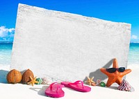 White Wooden Board with other Objects by the Beach