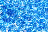 Swimming pool water textured background