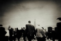 Abstract blurred business people commuting during rush hour black and white