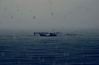 Abandoned Boat Rainy Dark Sea