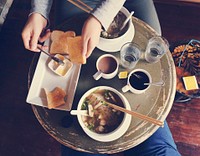 Couple having breakfast in cafe