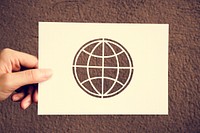 Hand Hold Globe Paper Carving with Brown Background