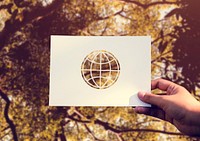 Hand Hold Globe Paper Carving with Nature Background