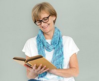 Mature Caucasian Woman Smiling Holding Notebook