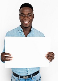 Guy smiling and holding a blank placard