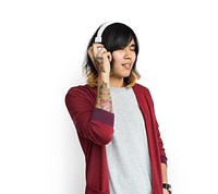 Asian Man Tattooed Arm Headphones