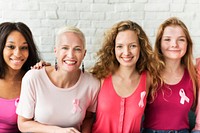 A group of diverse women with pink ribbon for breast cancer awareness