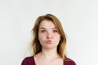 Young girl making kiss gesture portrait