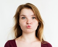 Young girl kissing gesture studio portrait