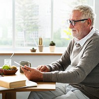 Senior Adult Using Digital Device Tablet Concept