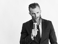 Business man talking on microphone grayscale