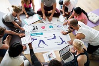 Diverse group of people in a circle learning about the basics of yoga