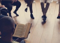 People sitting in a circle counseling