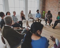 People sitting in a circle counseling