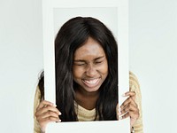 African Descent Holding Frame Smiling Concept