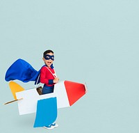 Superhero Boy Smiling Playing Cardboard Airplane Portrait