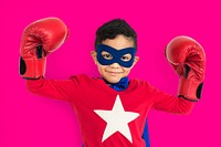 Superhero boy wearing boxing gloves