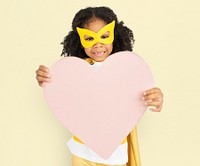 Superhero Kid Carrying Heart Concept