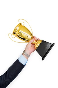 Human Hand Holding Trophy Reward Success