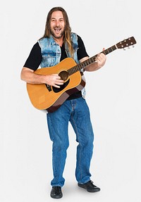 Longhaired man playing on a guitar