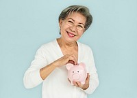 Senior Adult Hold Piggy Bank Concept
