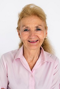Studio portrait of a senior lady smiling