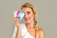 Blonde Girl Holding Credit Cards Concept