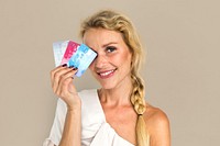 Blonde Girl Holding Credit Cards Concept