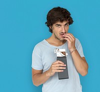 Caucasian Man Eating Chocolate Concept