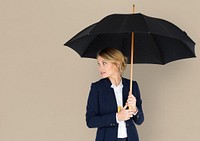 Business Woman Looking Back Umbrella Concept